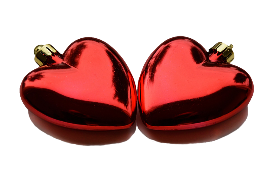 two red Christmas heart decorations