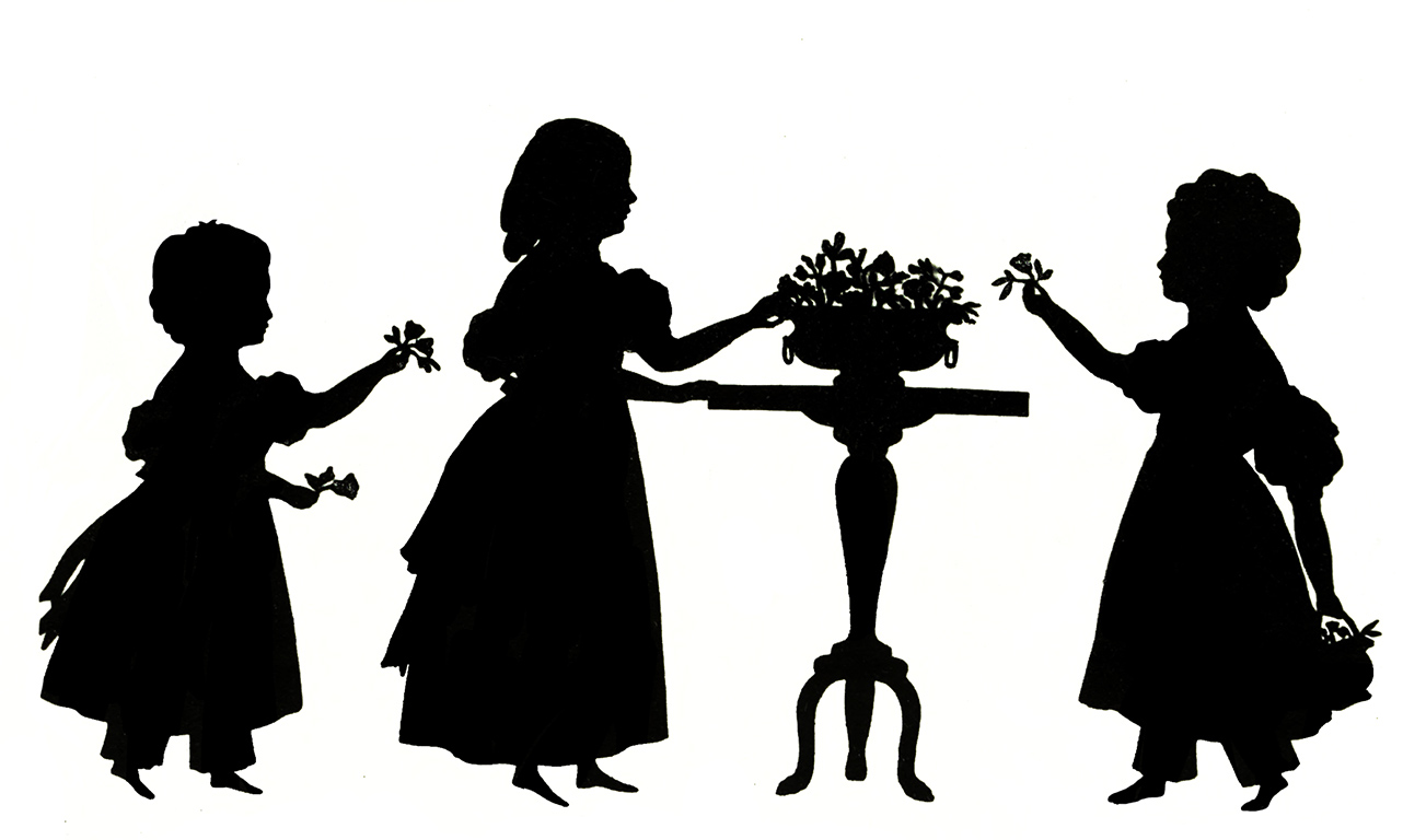 three little victorian girls with flowers